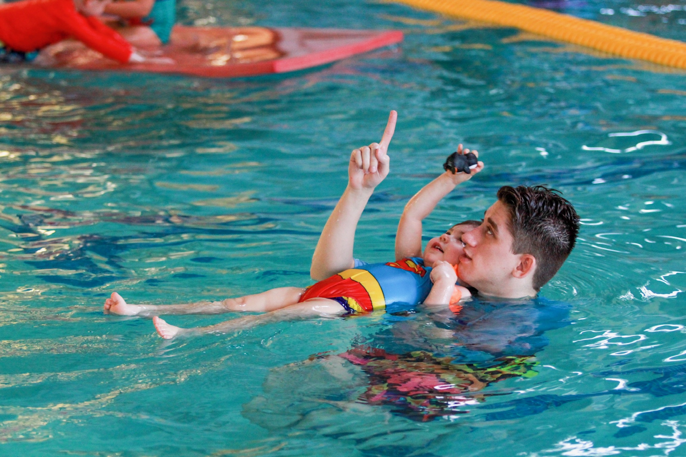 Patient Coach teaches baby to back float