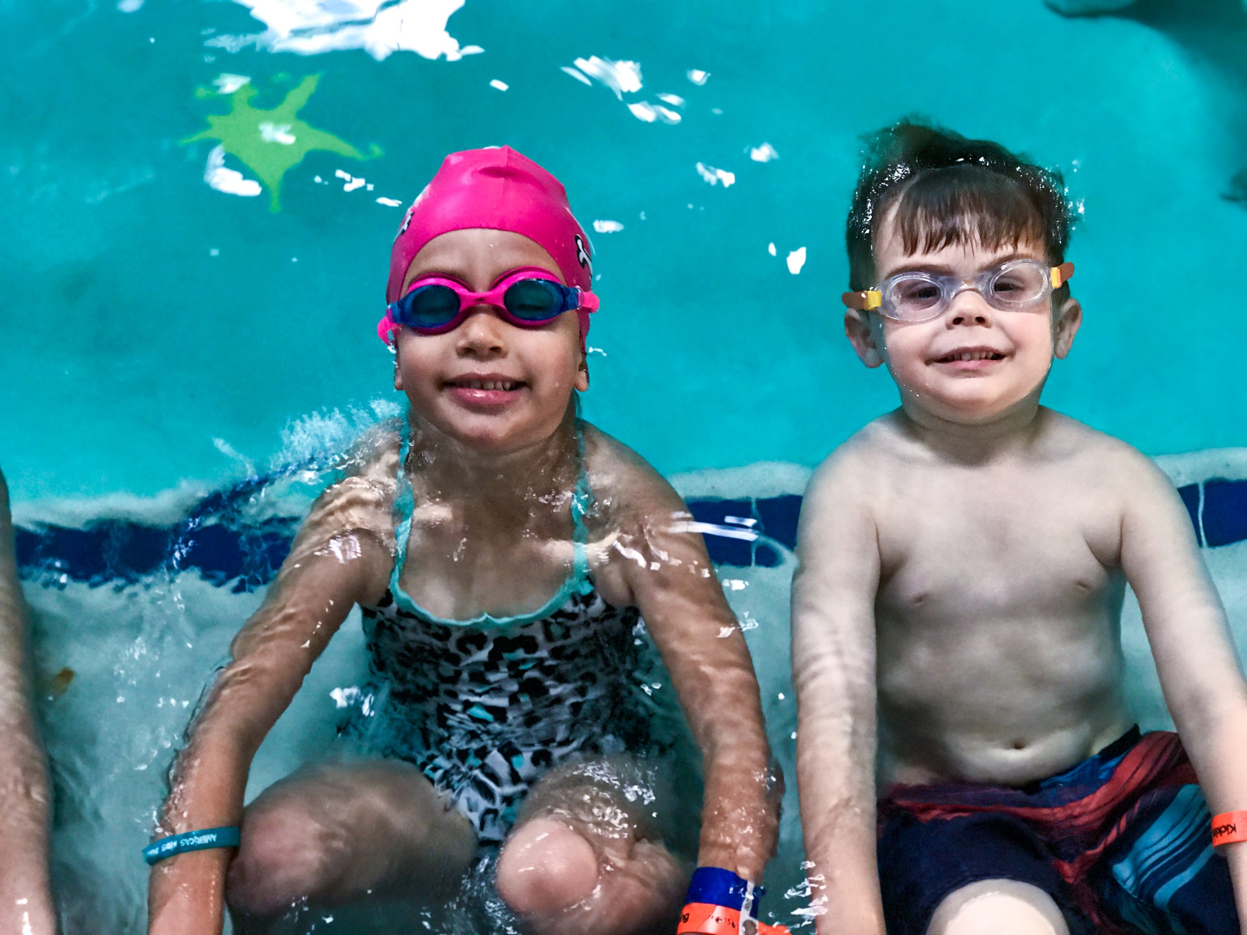 Group swim class teaches live saving skills with fun interactive class environment