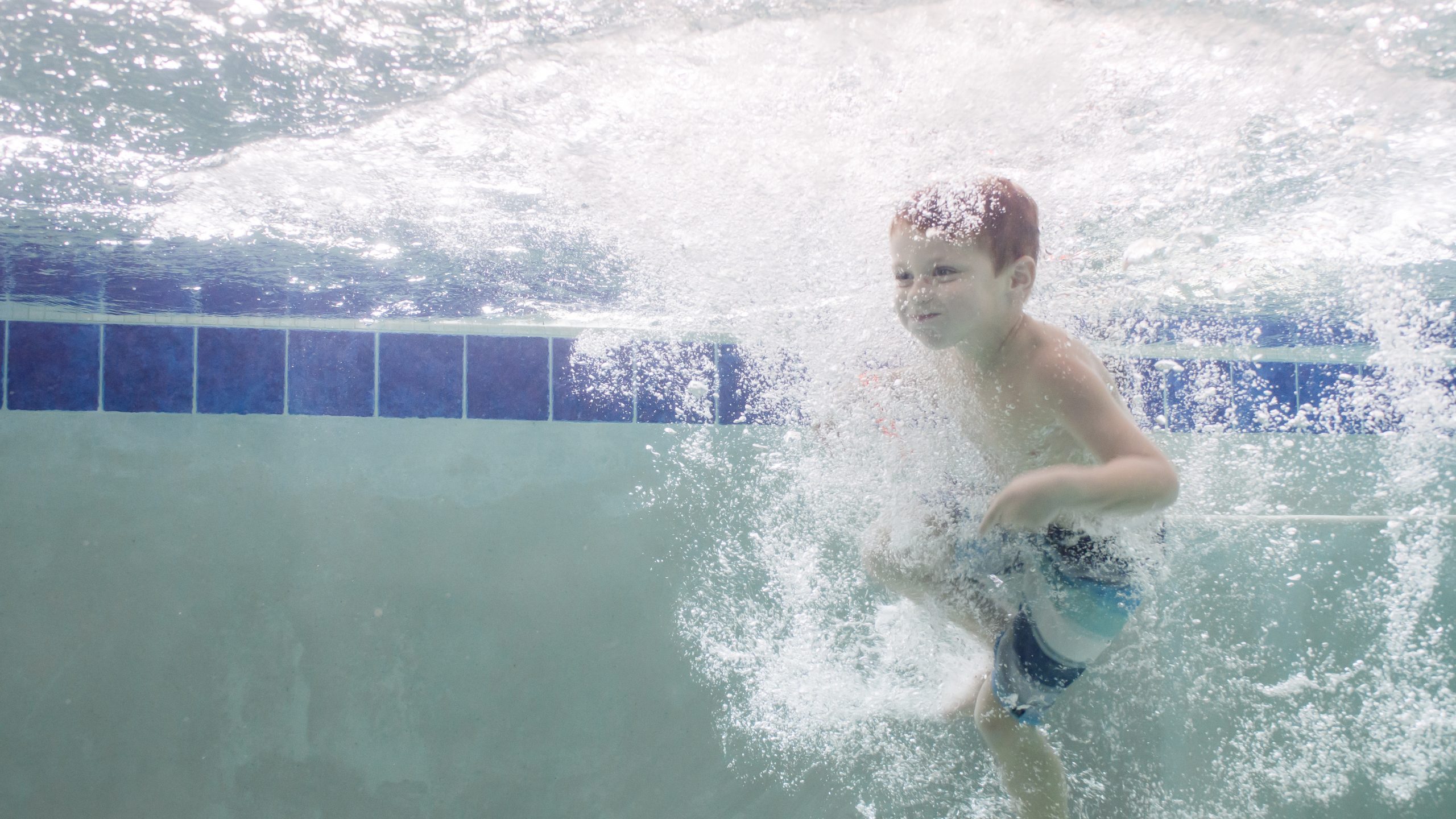 Swimmer loves to jump in and go underwater