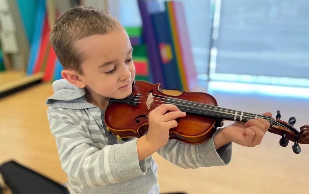 Child playing music