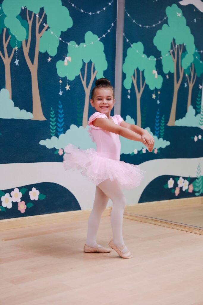 Little ballet girl posing